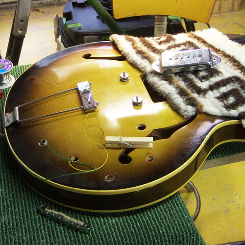 electronics of the guitar are placed back in the body